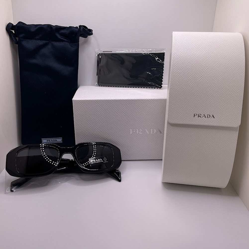 These sunglasses will elevate your fashion game. Prada PR17WS 1AB5S049 Black New